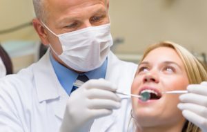 Установка зубных протезов и имплантов